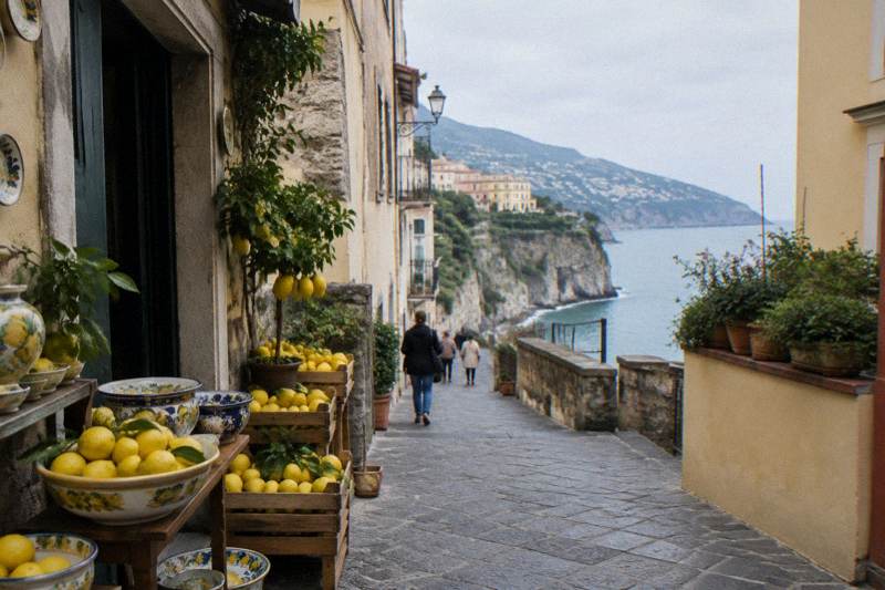 A lane in Sorrento with lemons for sale outside the shops