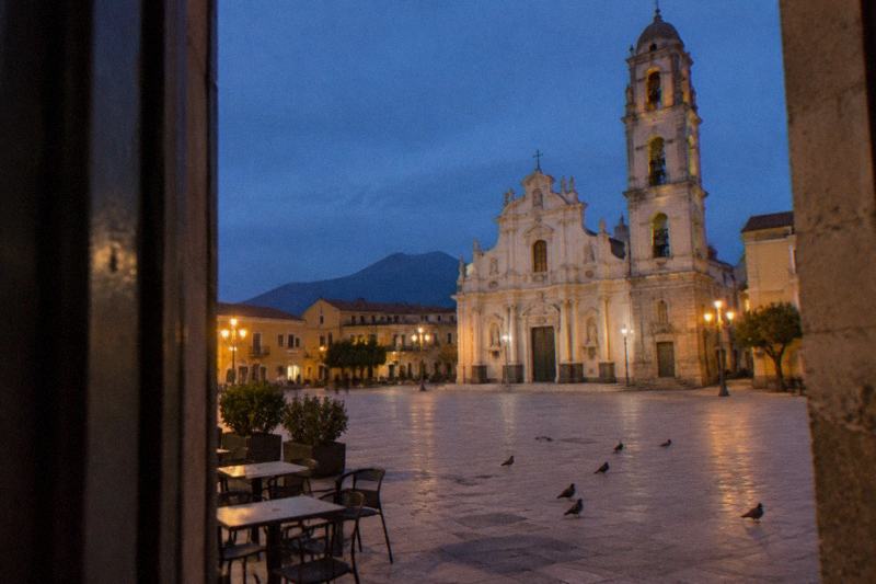 The broad square and tall campanile of the sanctuary in modern Pompei