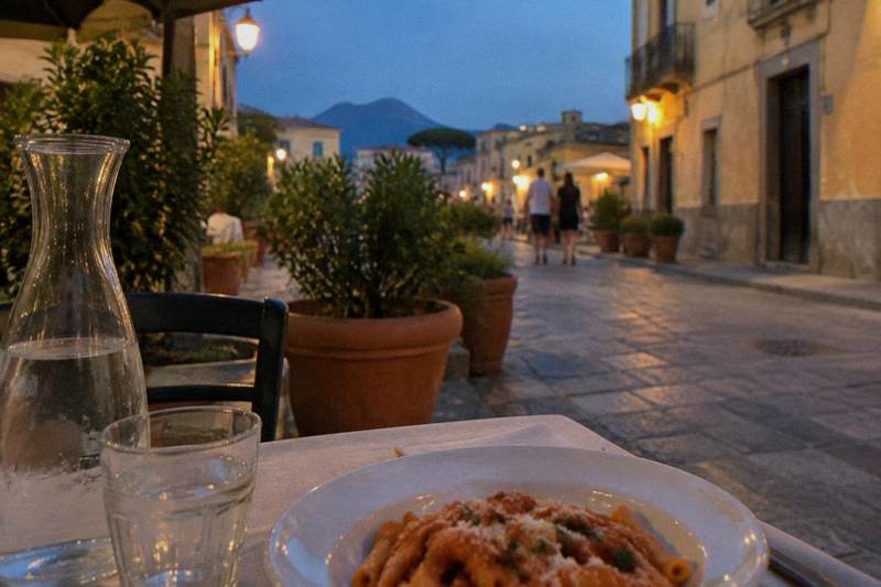 A pasta lunch at a pavement table in Pompei town