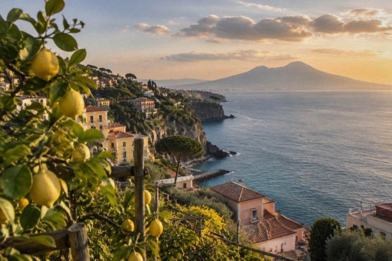 A cliff-top view over Sorrento with Vesuvius across the bay