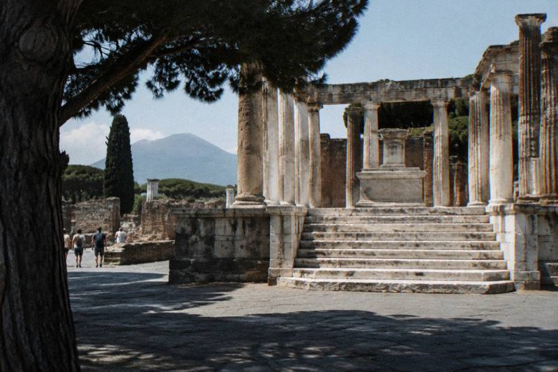 A raised temple platform in a colonnaded court at Pompeii