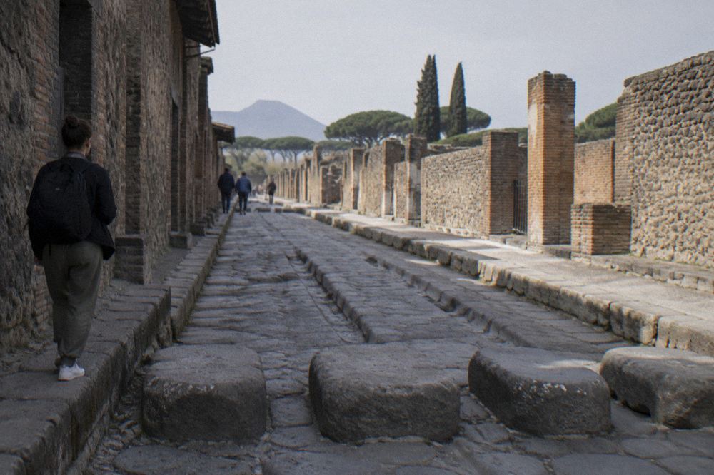 View of the modern town of Pompei with the Sanctuary of the Blessed Virgin of the Rosary and Mount Vesuvius in the distance