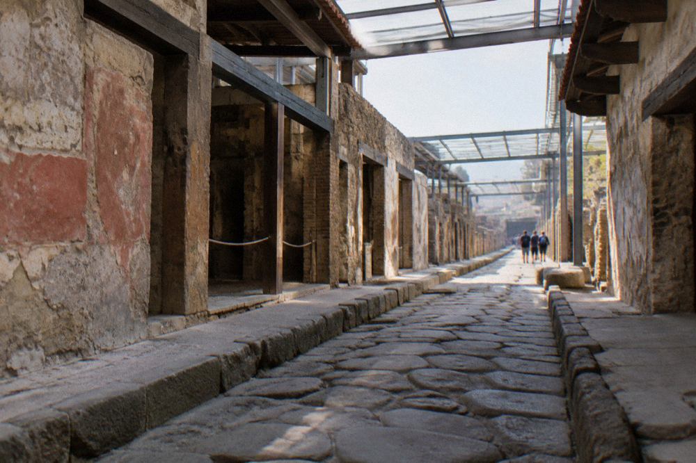 Ancient Herculaneum street with well-preserved Roman buildings and mosaic floors