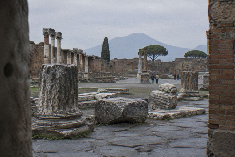 The pilgrimage basilica of the modern town of Pompei seen from a surrounding square