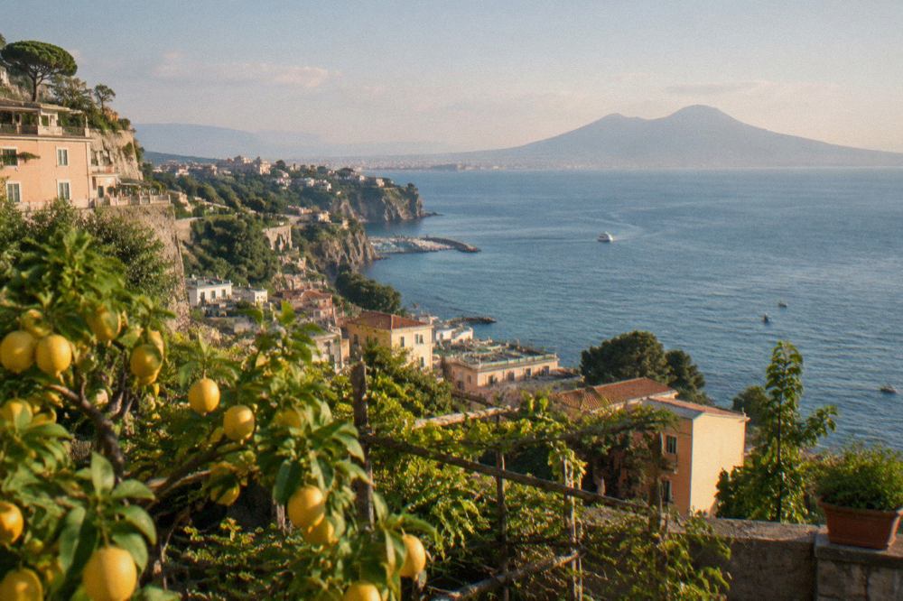 Pastel buildings and narrow streets above the Bay of Naples at Sorrento