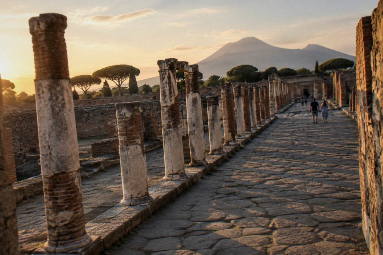 Rows of stone stepping stones crossing an ancient Roman street with worn cart ruts