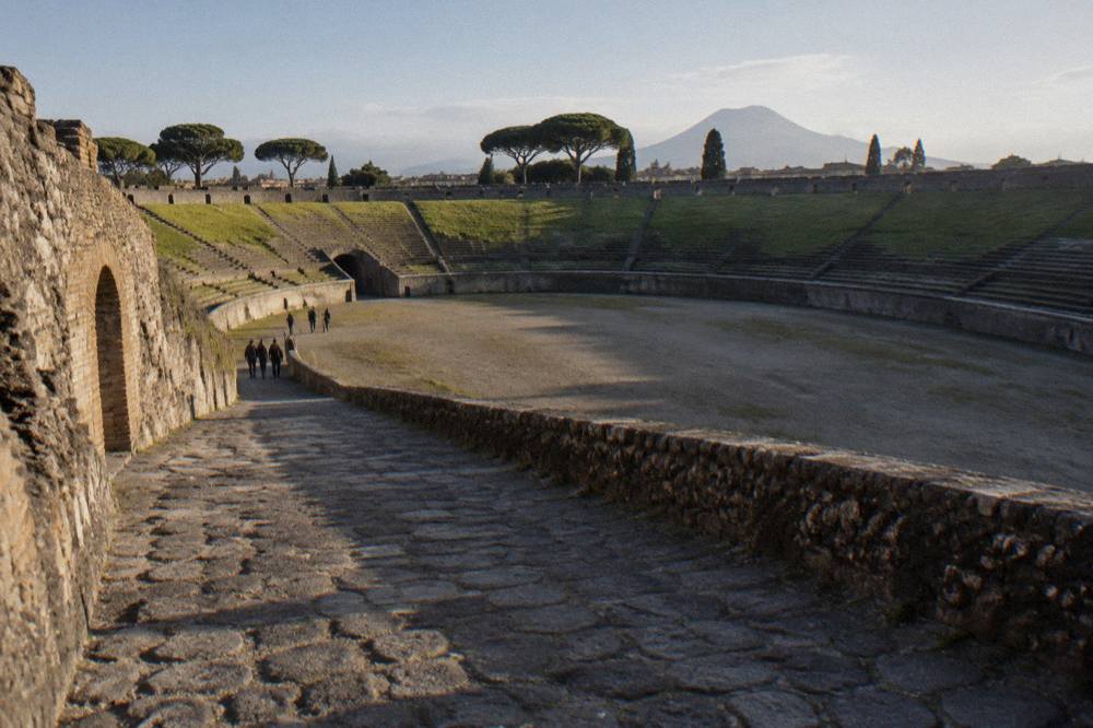 Stone Roman walls and column bases of an excavated villa overlooking the sea