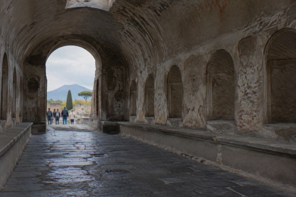 Ancient beach surface at the base of the Herculaneum excavation beneath the stone vaults