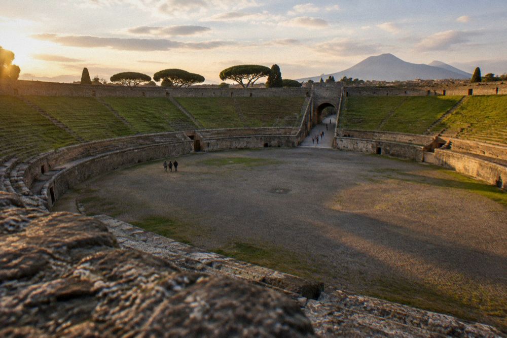 Terrace overlooking the excavation pit toward Mount Vesuvius on the horizon