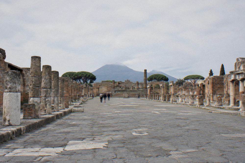 Basalt stone road surface of a Roman street in Pompeii with stepping stones crossing it