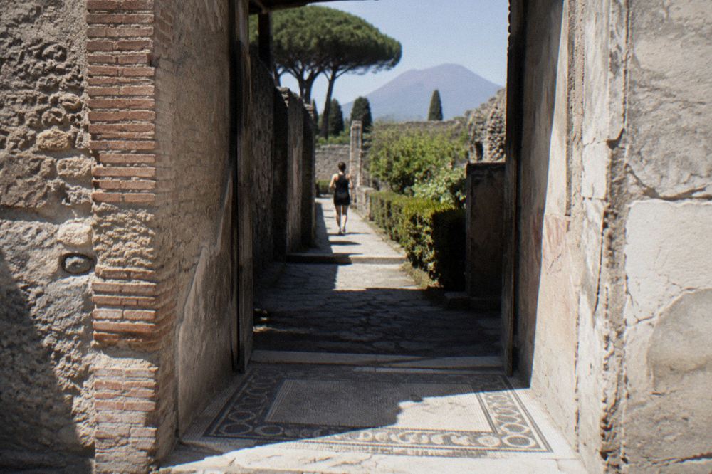 Quiet ancient Roman street in Pompeii in soft early morning light