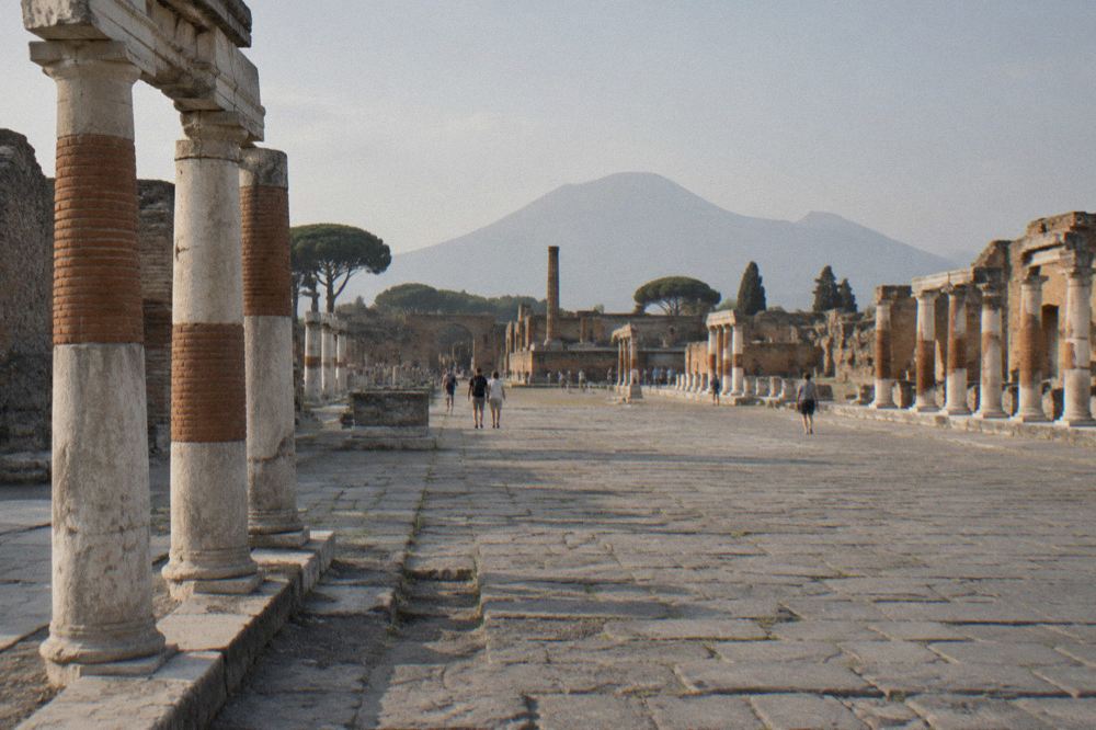 Rows of stone steps rising in a semicircle around an empty stage area
