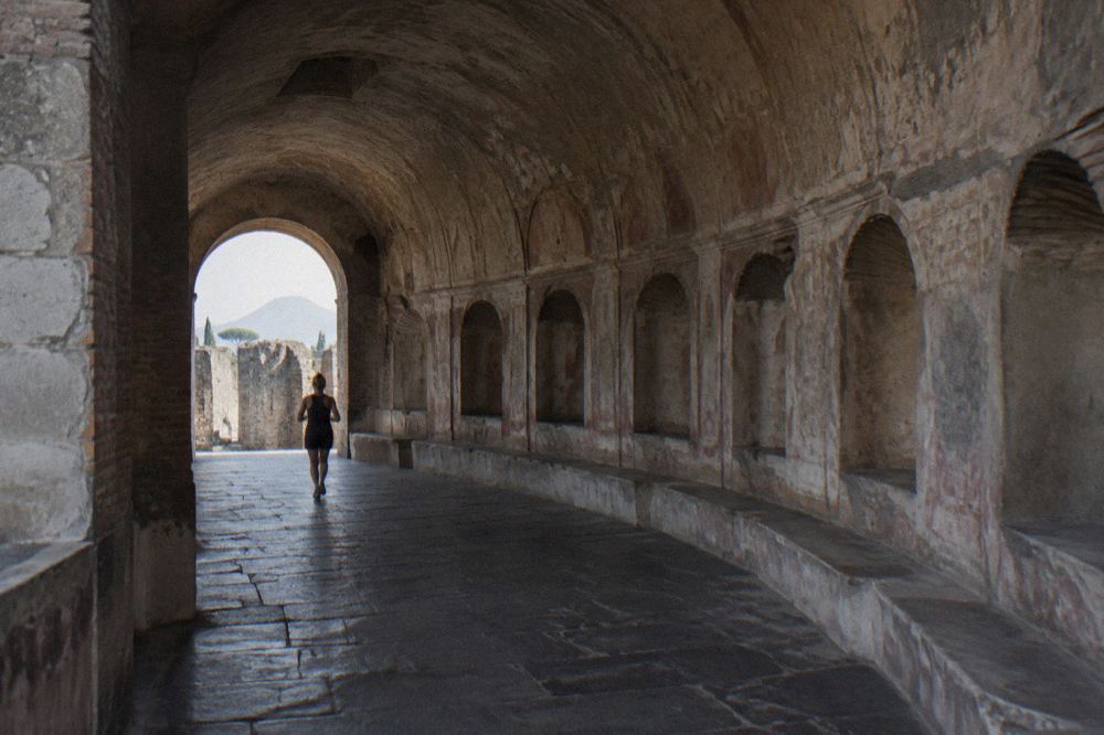 The interior nave of the Sanctuary of Pompei with its columns and painted ceiling