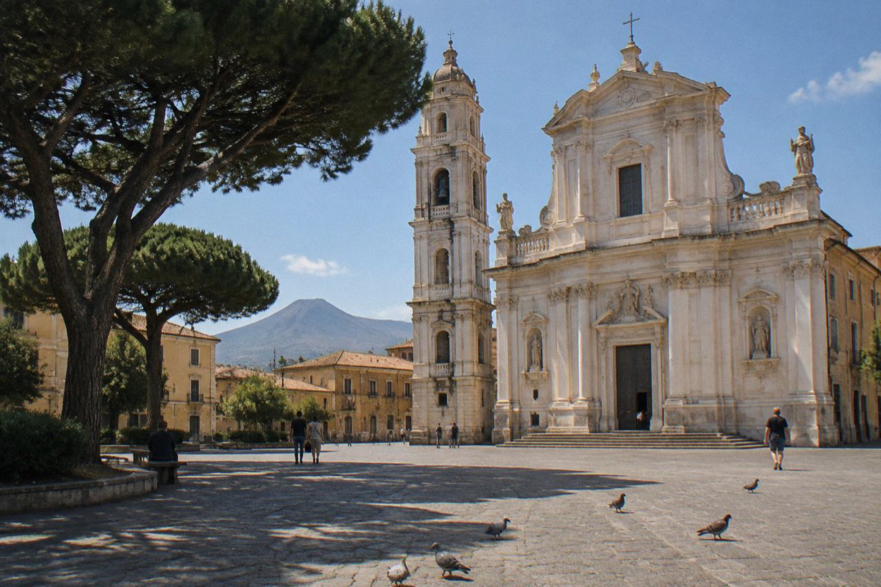 The facade and bell tower of the Sanctuary of Pompei seen from the square in front