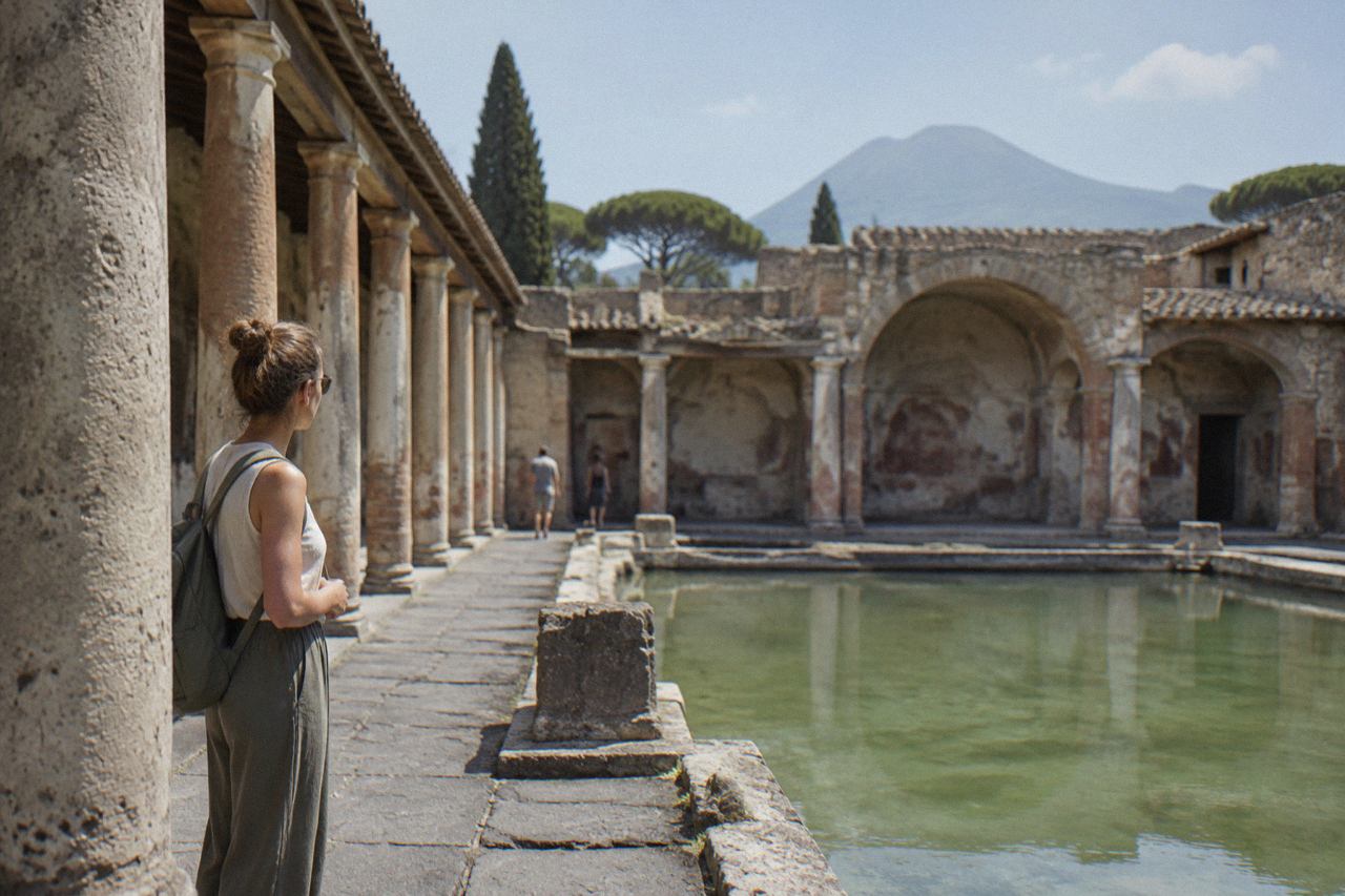 Ancient stone bathing rooms of the Stabian Baths in Pompeii under open sky
