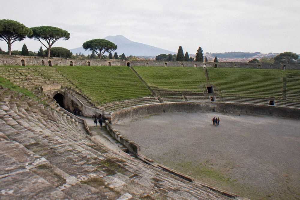 An ancient Roman street in the excavations with stone pavements and high walls