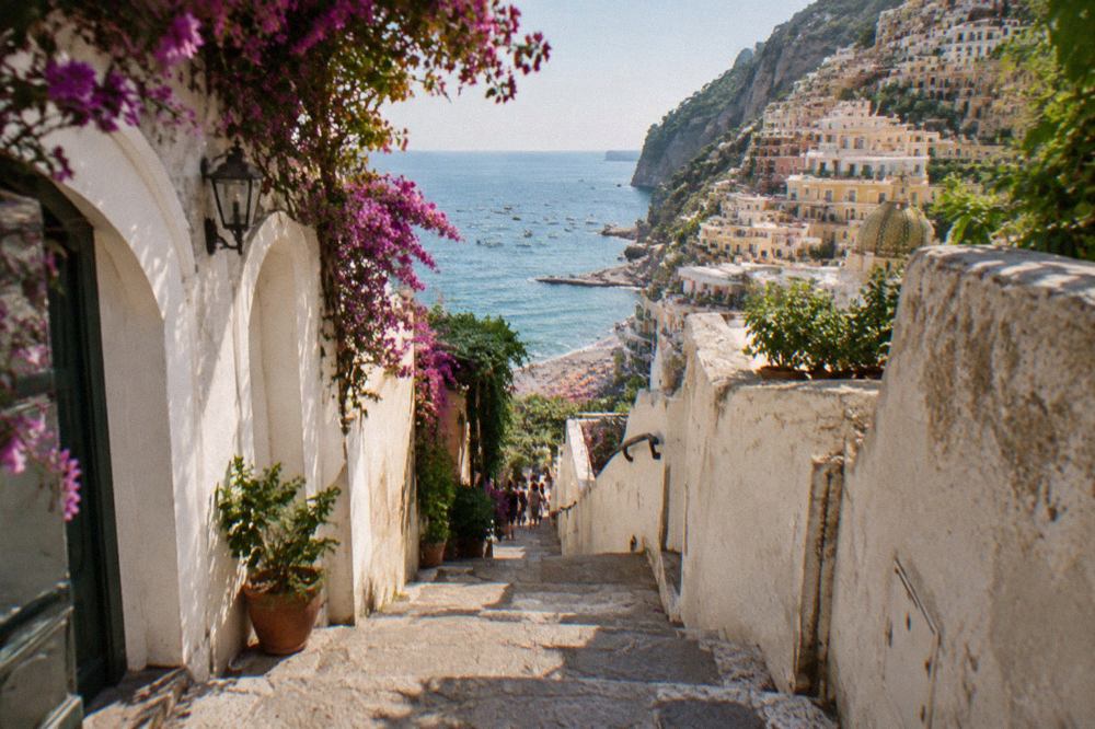 Pastel houses of Positano stacked on a cliff above the Tyrrhenian sea