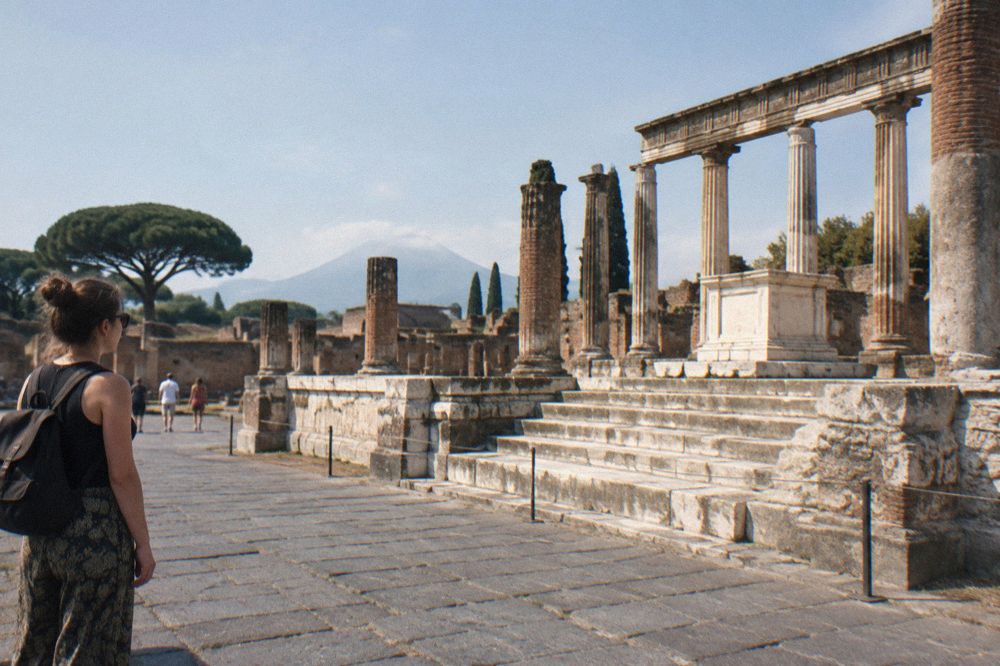 Long stone road lined with ancient tombs leading toward the villas outside Pompeii's walls