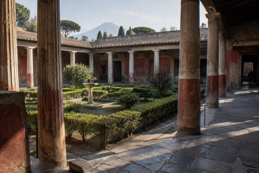 An interior room of a Roman house at Pompeii with painted walls and a mosaic floor