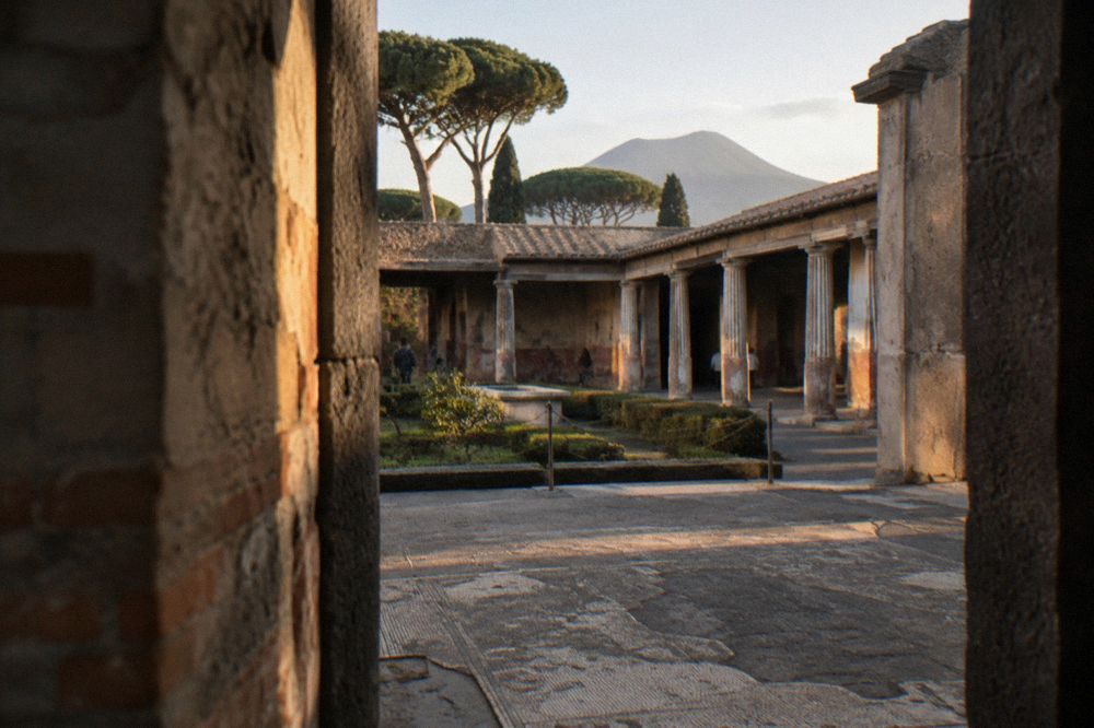 A quiet excavated street at Pompeii in early morning light