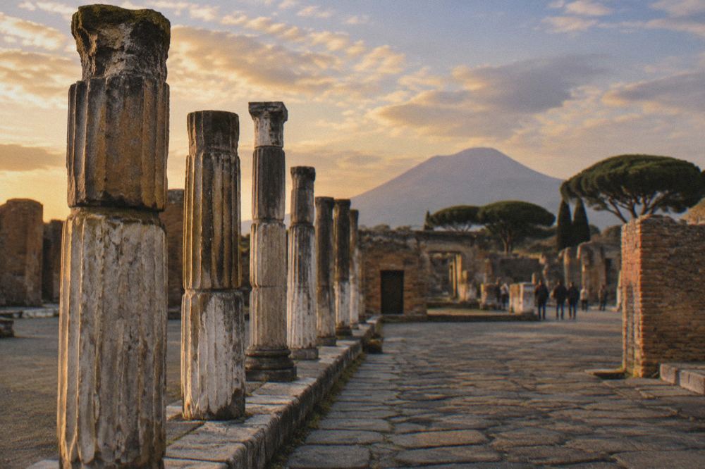 Guide speaking to visitors on a paved ancient street at Pompeii
