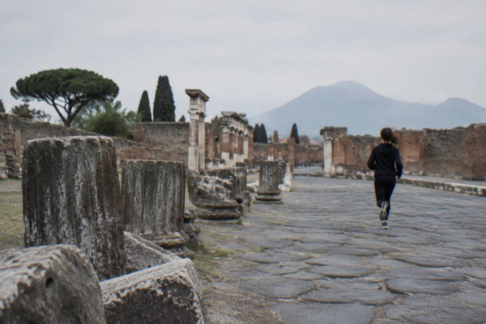 Painted inscription panel on a Pompeii street wall in red pigment