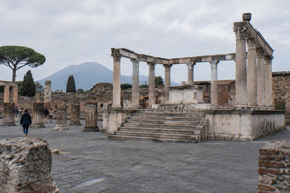 Overview of the Pompeii excavations with rows of ruined walls along ancient streets