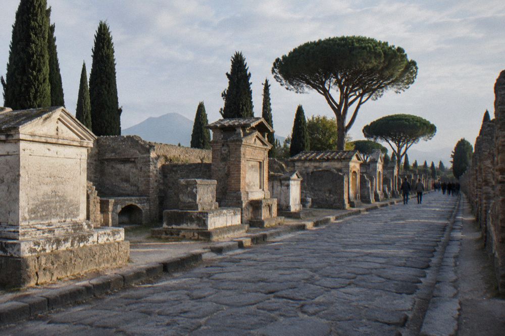 Empty Pompeii doorway framing a view of stone walls and sky