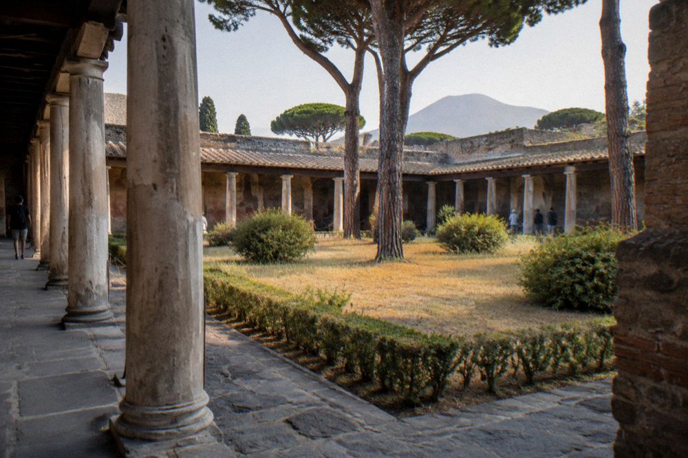 Two ancient Roman sites connected by a coastal railway line on the Bay of Naples