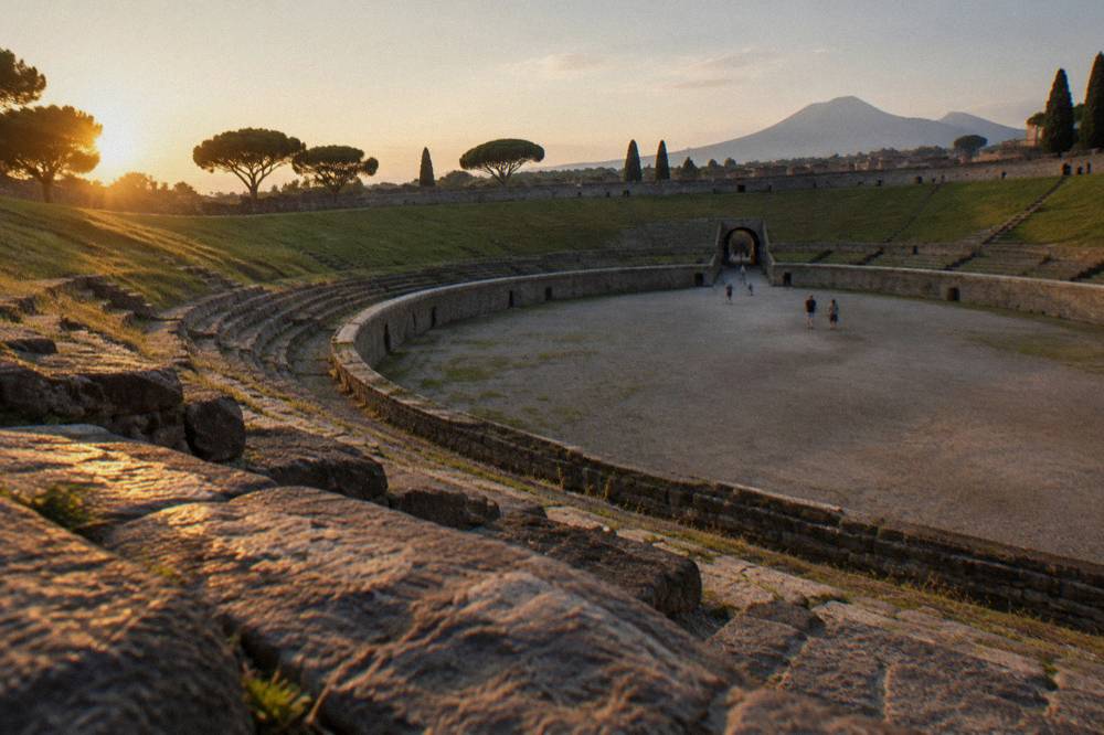 Ancient stone columns of the Forum at Pompeii with Vesuvius in the distance